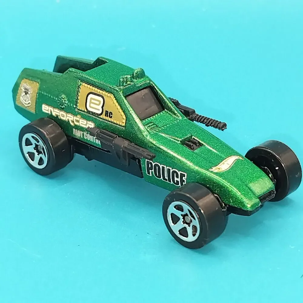 Hot Wheels Enforcer Riot Control Police Car Green Diecast Vehicle Mattel